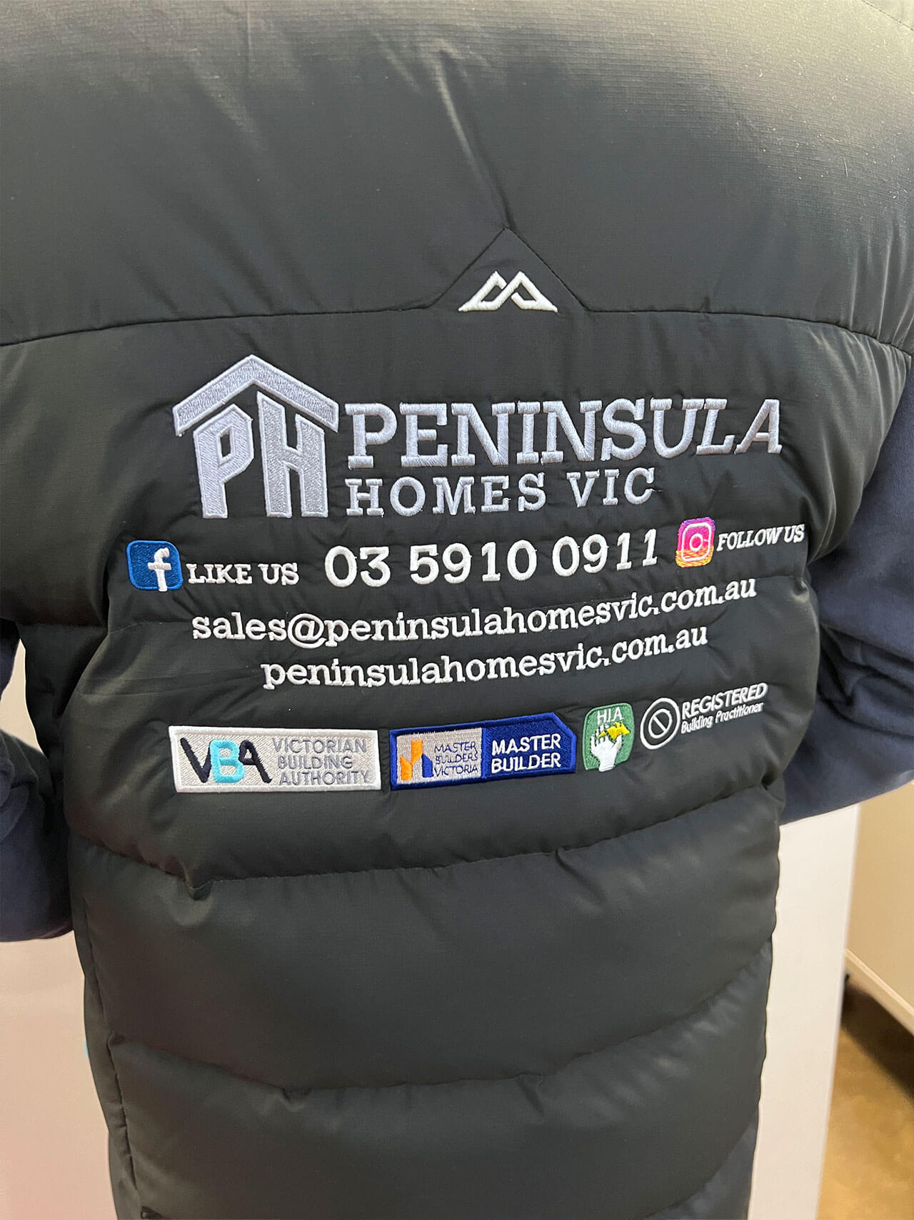 Peninsula Homes Vic embroidered logo and text on jacket